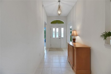 Welcome to this beautifully expanded Gardenia model in Sunset on The Links of Spruce Creek in Florida - for sale on GolfHomes.com, golf home, golf lot