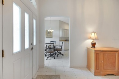 Welcome to this beautifully expanded Gardenia model in Sunset on The Links of Spruce Creek in Florida - for sale on GolfHomes.com, golf home, golf lot