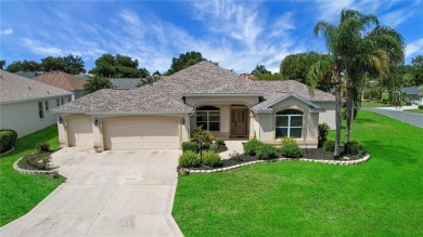 Welcome to this beautifully expanded Gardenia model in Sunset on The Links of Spruce Creek in Florida - for sale on GolfHomes.com, golf home, golf lot