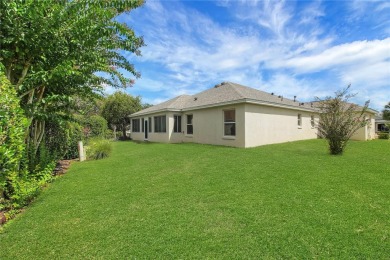 Welcome to this beautifully expanded Gardenia model in Sunset on The Links of Spruce Creek in Florida - for sale on GolfHomes.com, golf home, golf lot