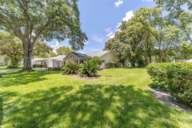 This end unit is unique with the wide open greenspace around on On Top of the World Golf Course in Florida - for sale on GolfHomes.com, golf home, golf lot