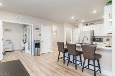 Impeccable, upgrade-rich, and truly move-in ready-this lakefront on Herons Glen Golf and Country Club in Florida - for sale on GolfHomes.com, golf home, golf lot