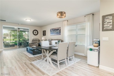 Impeccable, upgrade-rich, and truly move-in ready-this lakefront on Herons Glen Golf and Country Club in Florida - for sale on GolfHomes.com, golf home, golf lot