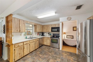 This end unit is unique with the wide open greenspace around on On Top of the World Golf Course in Florida - for sale on GolfHomes.com, golf home, golf lot