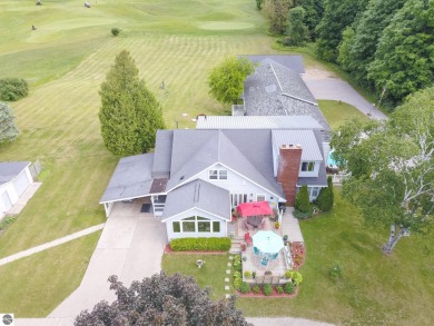 Beautifully kept family home in a very peaceful setting. 3+ on Bay Meadows Golf Course - Executive in Michigan - for sale on GolfHomes.com, golf home, golf lot
