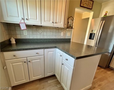 **FURNISHED END UNIT RIGHT ON THE MYERLEE COUNTRY CLUB GOLF on Myerlee Country Club in Florida - for sale on GolfHomes.com, golf home, golf lot