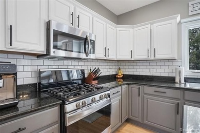 Situated on arguably one of the more desirable lots in one of on Prestwick Village Golf Club in Michigan - for sale on GolfHomes.com, golf home, golf lot