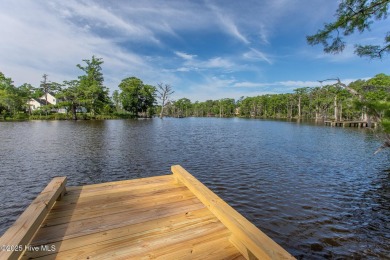 This picturesque property with a newly updated dock and new on Sound Golf Links at Albemarle Plantation in North Carolina - for sale on GolfHomes.com, golf home, golf lot