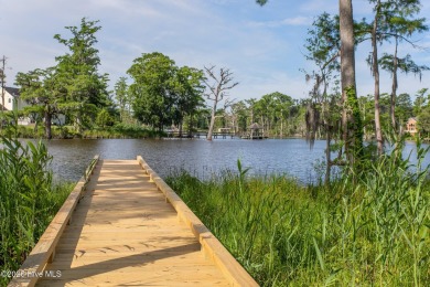 This picturesque property with a newly updated dock and new on Sound Golf Links at Albemarle Plantation in North Carolina - for sale on GolfHomes.com, golf home, golf lot