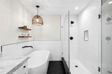 Luxurious single-story modern Dover model is located on a quiet on Big Canyon Country Club in California - for sale on GolfHomes.com, golf home, golf lot