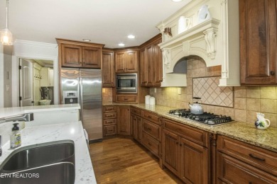 Discover the perfect blend of comfort and spacious living in on Fox Den Country Club in Tennessee - for sale on GolfHomes.com, golf home, golf lot