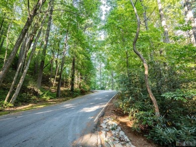 Welcome to this stunning vacant lot located on the prestigious on Lake Toxaway Country Club in North Carolina - for sale on GolfHomes.com, golf home, golf lot