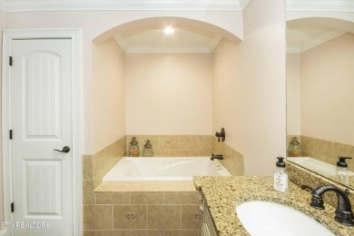 Discover the perfect blend of comfort and spacious living in on Fox Den Country Club in Tennessee - for sale on GolfHomes.com, golf home, golf lot