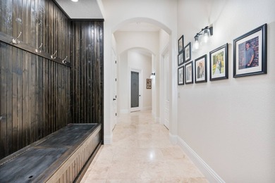 Welcome to a home that isn't just designed-it's curated on The Golden Bear Club At Keenes Pointe in Florida - for sale on GolfHomes.com, golf home, golf lot