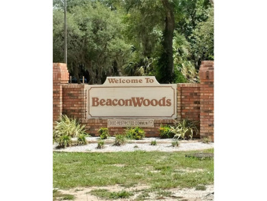 Welcome to Beacon Woods where this home is located in Hitching on Beacon Woods Golf Club in Florida - for sale on GolfHomes.com, golf home, golf lot