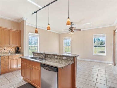 One or more photo(s) has been virtually staged. Located in an on Lakes of Lady Lake Golf Course in Florida - for sale on GolfHomes.com, golf home, golf lot