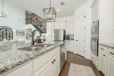 Nestled in the prestigious Heath Golf and Yacht community, this on Heath Golf and Yacht Club in Texas - for sale on GolfHomes.com, golf home, golf lot