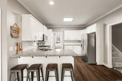 Beautiful home in highly sought-after Osage Falls Estates on Maumelle Golf and Country Club in Arkansas - for sale on GolfHomes.com, golf home, golf lot