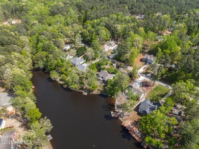 Priced to Sell! Stunning Waterfront Home on Rare Double Lot in on River Golf and Country Club at Lake Royale in North Carolina - for sale on GolfHomes.com, golf home, golf lot