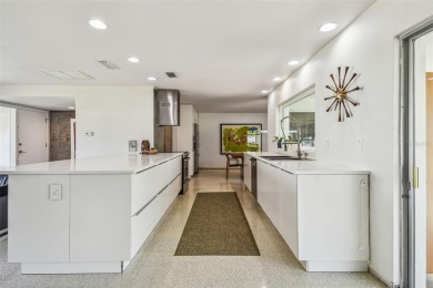 Mid-Century Modern Ranch on Pelican Golf Course.
Bathed in on Belleview Biltmore Golf Club in Florida - for sale on GolfHomes.com, golf home, golf lot