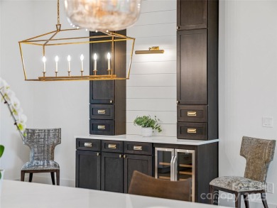 Modern farmhouse elegance meets refined mountain living in this on Country Club of Asheville in North Carolina - for sale on GolfHomes.com, golf home, golf lot