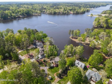 Priced to Sell! Stunning Waterfront Home on Rare Double Lot in on River Golf and Country Club at Lake Royale in North Carolina - for sale on GolfHomes.com, golf home, golf lot