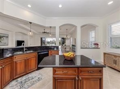 Breathtaking Lake & Sunset Views | Maintenance-Free Luxury on Venetian Golf and River Club in Florida - for sale on GolfHomes.com, golf home, golf lot