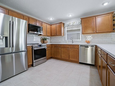 LOVELY 2-bedroom, 2-bath COURTYARD VILLA located in the VILLAGE on Pennbrooke Fairways in Florida - for sale on GolfHomes.com, golf home, golf lot