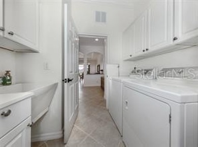 Breathtaking Lake & Sunset Views | Maintenance-Free Luxury on Venetian Golf and River Club in Florida - for sale on GolfHomes.com, golf home, golf lot