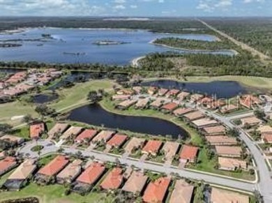 Breathtaking Lake & Sunset Views | Maintenance-Free Luxury on Venetian Golf and River Club in Florida - for sale on GolfHomes.com, golf home, golf lot