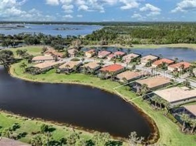 Breathtaking Lake & Sunset Views | Maintenance-Free Luxury on Venetian Golf and River Club in Florida - for sale on GolfHomes.com, golf home, golf lot