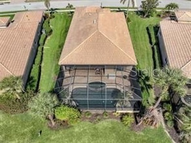 Breathtaking Lake & Sunset Views | Maintenance-Free Luxury on Venetian Golf and River Club in Florida - for sale on GolfHomes.com, golf home, golf lot