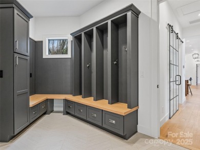 Modern farmhouse elegance meets refined mountain living in this on Country Club of Asheville in North Carolina - for sale on GolfHomes.com, golf home, golf lot