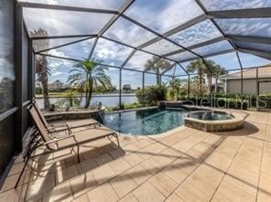 Breathtaking Lake & Sunset Views | Maintenance-Free Luxury on Venetian Golf and River Club in Florida - for sale on GolfHomes.com, golf home, golf lot