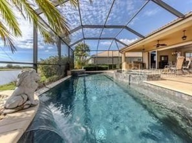 Breathtaking Lake & Sunset Views | Maintenance-Free Luxury on Venetian Golf and River Club in Florida - for sale on GolfHomes.com, golf home, golf lot