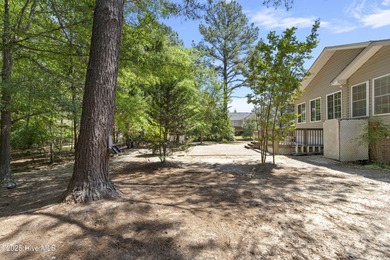 Welcome Home. That is what you will be saying when you see this on Carolina Trace Country Club in North Carolina - for sale on GolfHomes.com, golf home, golf lot