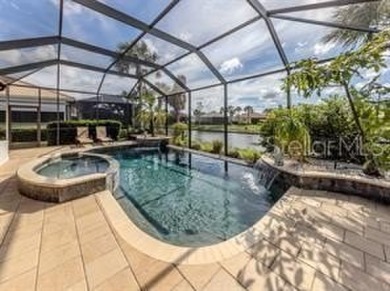 Breathtaking Lake & Sunset Views | Maintenance-Free Luxury on Venetian Golf and River Club in Florida - for sale on GolfHomes.com, golf home, golf lot