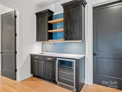 Modern farmhouse elegance meets refined mountain living in this on Country Club of Asheville in North Carolina - for sale on GolfHomes.com, golf home, golf lot