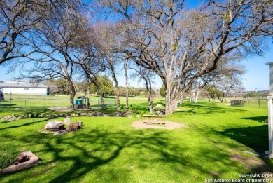 Nestled in the scenic surroundings of Canyon Lake, this charming on Canyon Lake Golf Club in Texas - for sale on GolfHomes.com, golf home, golf lot