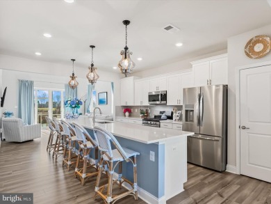 Experience the pinnacle of modern living and serene luxury in on Plantation Lakes Golf and Country Club in Delaware - for sale on GolfHomes.com, golf home, golf lot