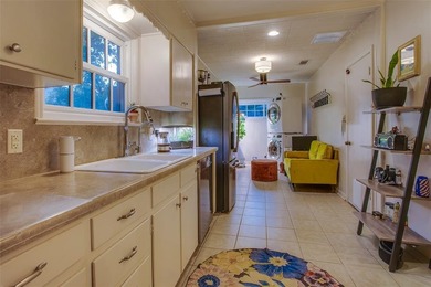 This Stevens Park Estates home blends classic Dallas charm with on Stevens Park Golf Course in Texas - for sale on GolfHomes.com, golf home, golf lot