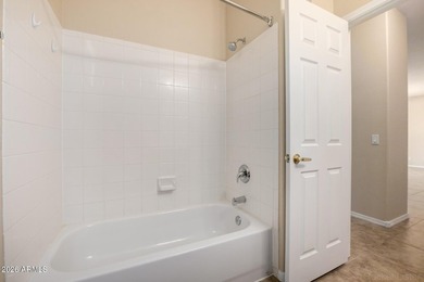 This inviting 2-bedroom, 2-bath unit offers comfort, convenience on Royal Palms Golf Course in Arizona - for sale on GolfHomes.com, golf home, golf lot