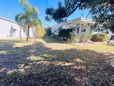 Corner Lot + Additional Lot | 5,881 Sq Ft | Charming Home in on Sara Bay Country Club in Florida - for sale on GolfHomes.com, golf home, golf lot