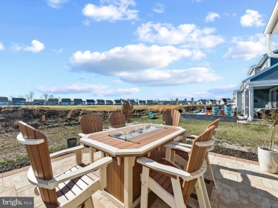 Experience the pinnacle of modern living and serene luxury in on Plantation Lakes Golf and Country Club in Delaware - for sale on GolfHomes.com, golf home, golf lot