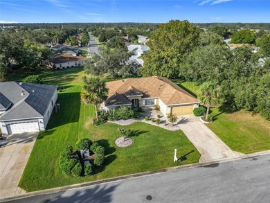 Under contract-accepting backup offers. Lovely stucco 3 on Eagle Ridge At Spruce Creek Country Club in Florida - for sale on GolfHomes.com, golf home, golf lot