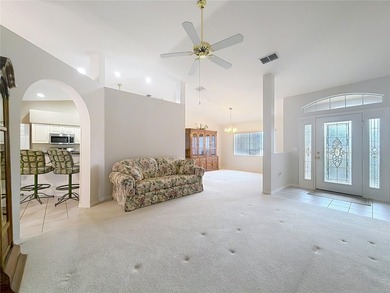 Under contract-accepting backup offers. Lovely stucco 3 on Eagle Ridge At Spruce Creek Country Club in Florida - for sale on GolfHomes.com, golf home, golf lot