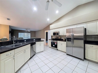 Under contract-accepting backup offers. Lovely stucco 3 on Eagle Ridge At Spruce Creek Country Club in Florida - for sale on GolfHomes.com, golf home, golf lot