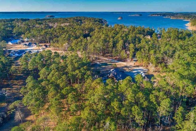 Nestled in a coveted enclave of Rayburn Country, this on Rayburn Country Club in Texas - for sale on GolfHomes.com, golf home, golf lot