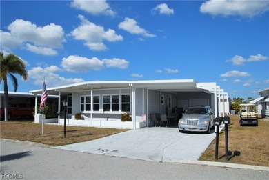 Updates galore in this turnkey retreat located in Six Lakes on Six Lakes Country Club in Florida - for sale on GolfHomes.com, golf home, golf lot