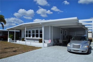 Updates galore in this turnkey retreat located in Six Lakes on Six Lakes Country Club in Florida - for sale on GolfHomes.com, golf home, golf lot